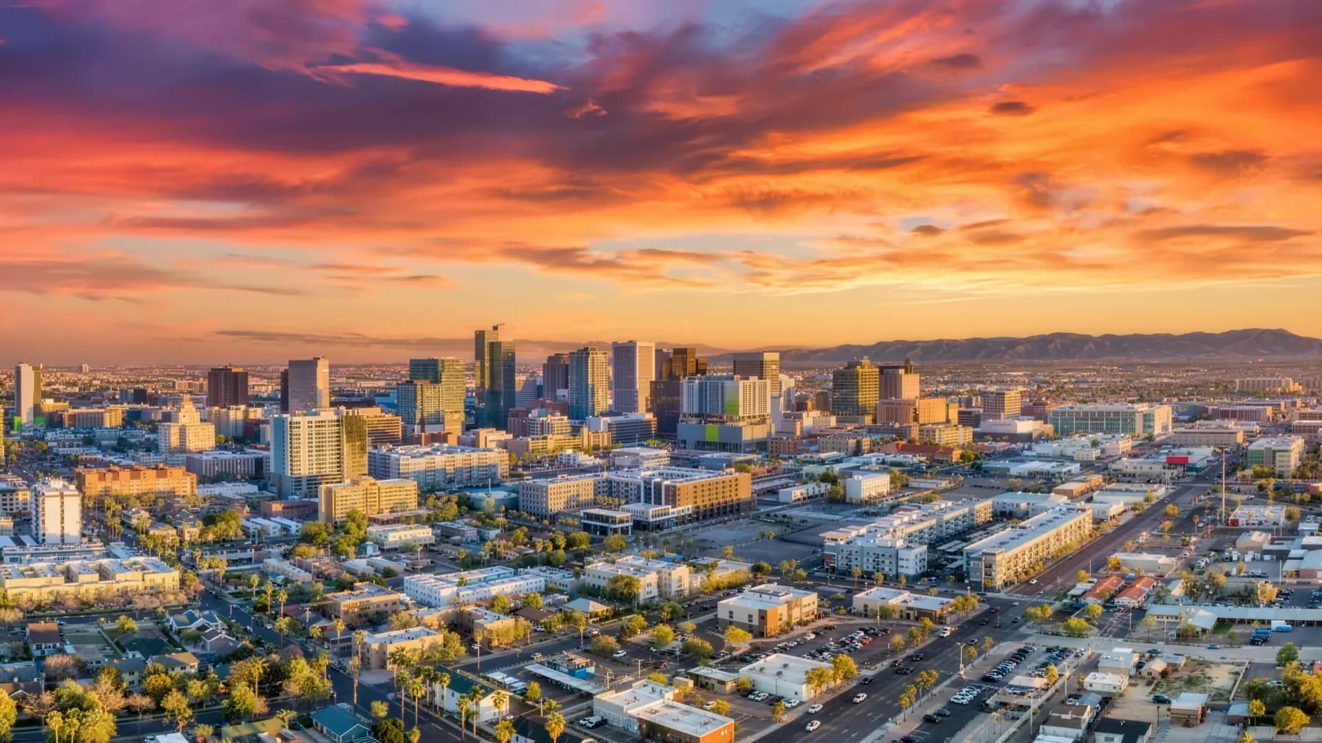 Aerial view of Phoenix Arizona homes at dusk — we buy houses in Maricopa County